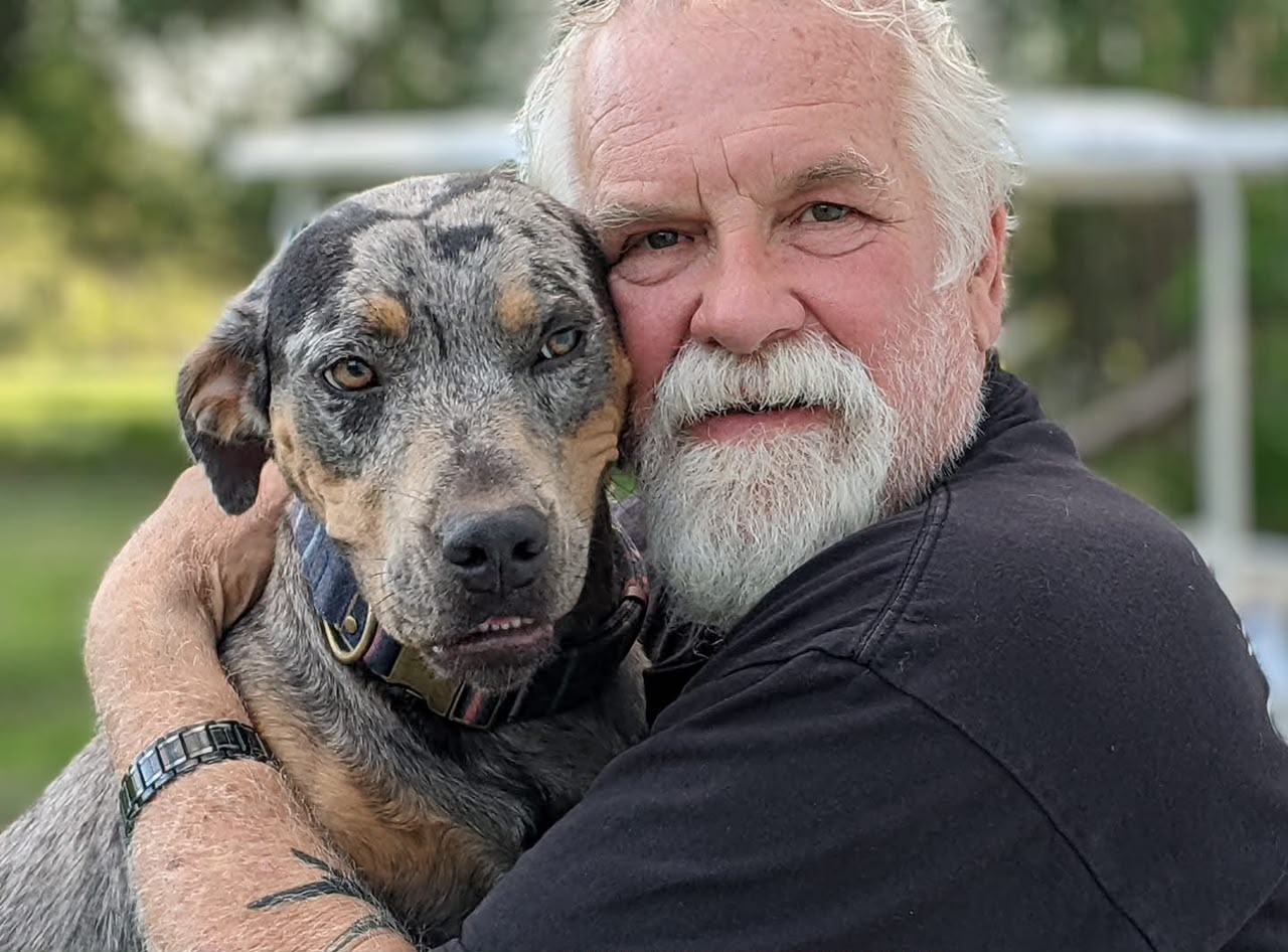 Robert Wilson with Catahoula Leopard Dog